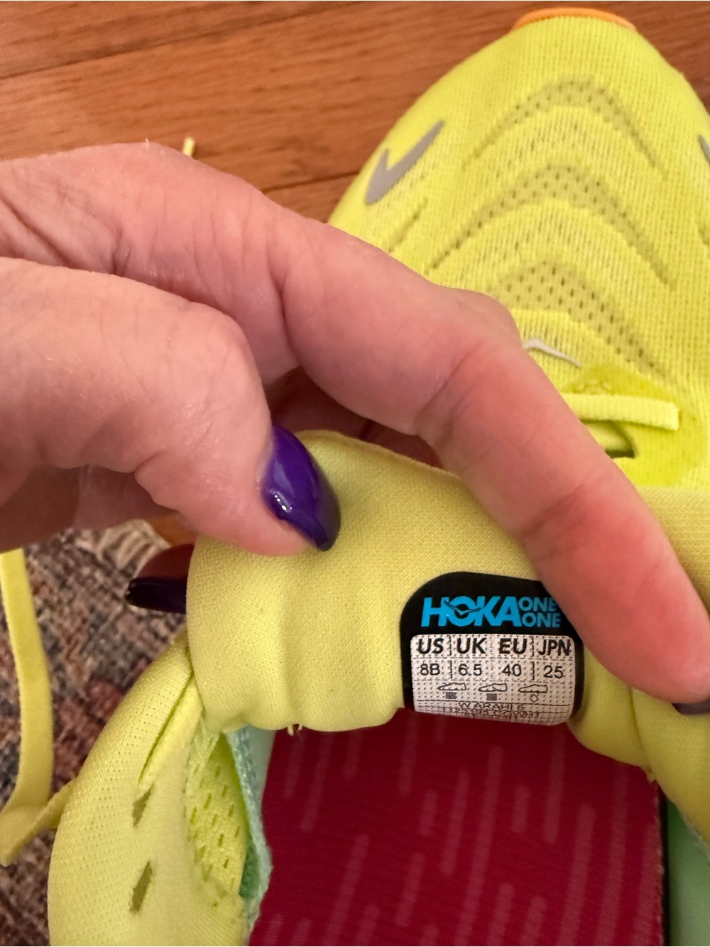 Women’s Hoka Arahi 6 Neon Yellow Athletic Running Shoes with Orange Accents - Picture 7 of 9